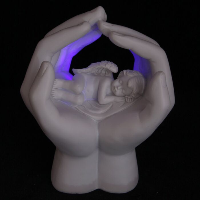 Querubim a dormir nas mãos com LED