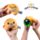 Brinquedo de pelúcia espremível Queasy Squeezies Biscoito com dado da sorte