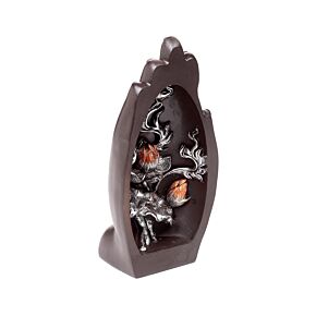 Lótus em prata e preto esculpido numa mão Lótus em prata e preto esculpido numa mão